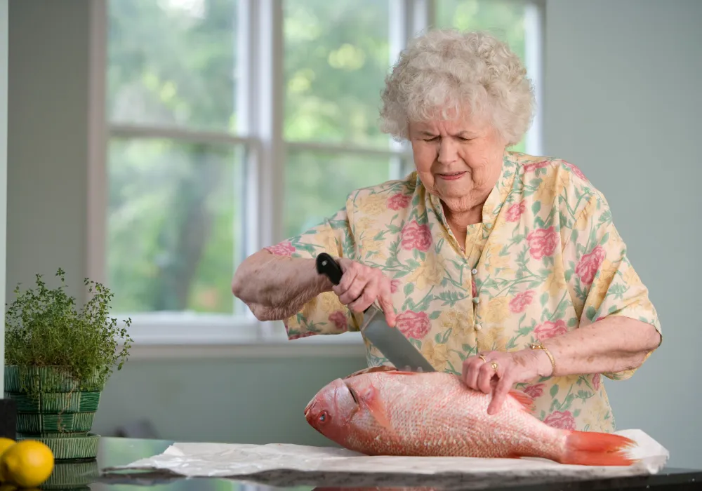 senior-cooking-fish